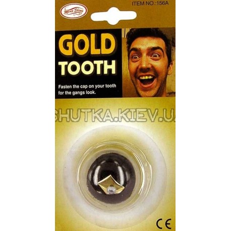 Золотий зуб з брюликом